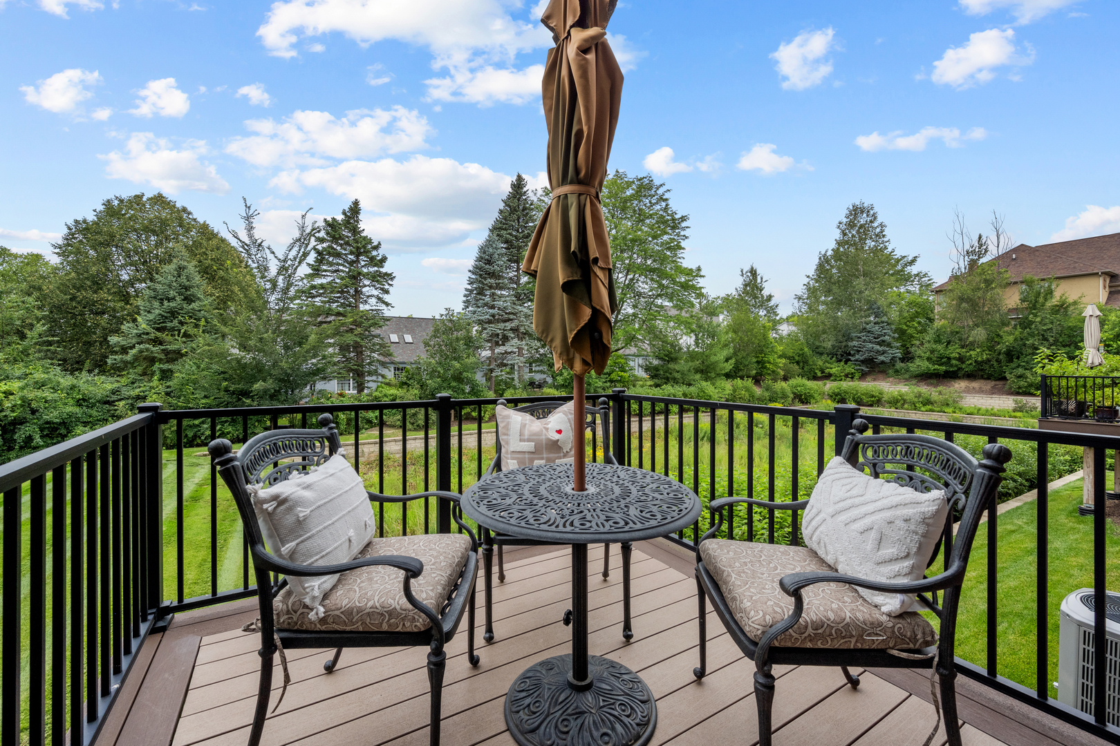 613 Bourbon Lane Naperville, IL 60565 - Photo 21 of 36 a view of a chair and table on the deck