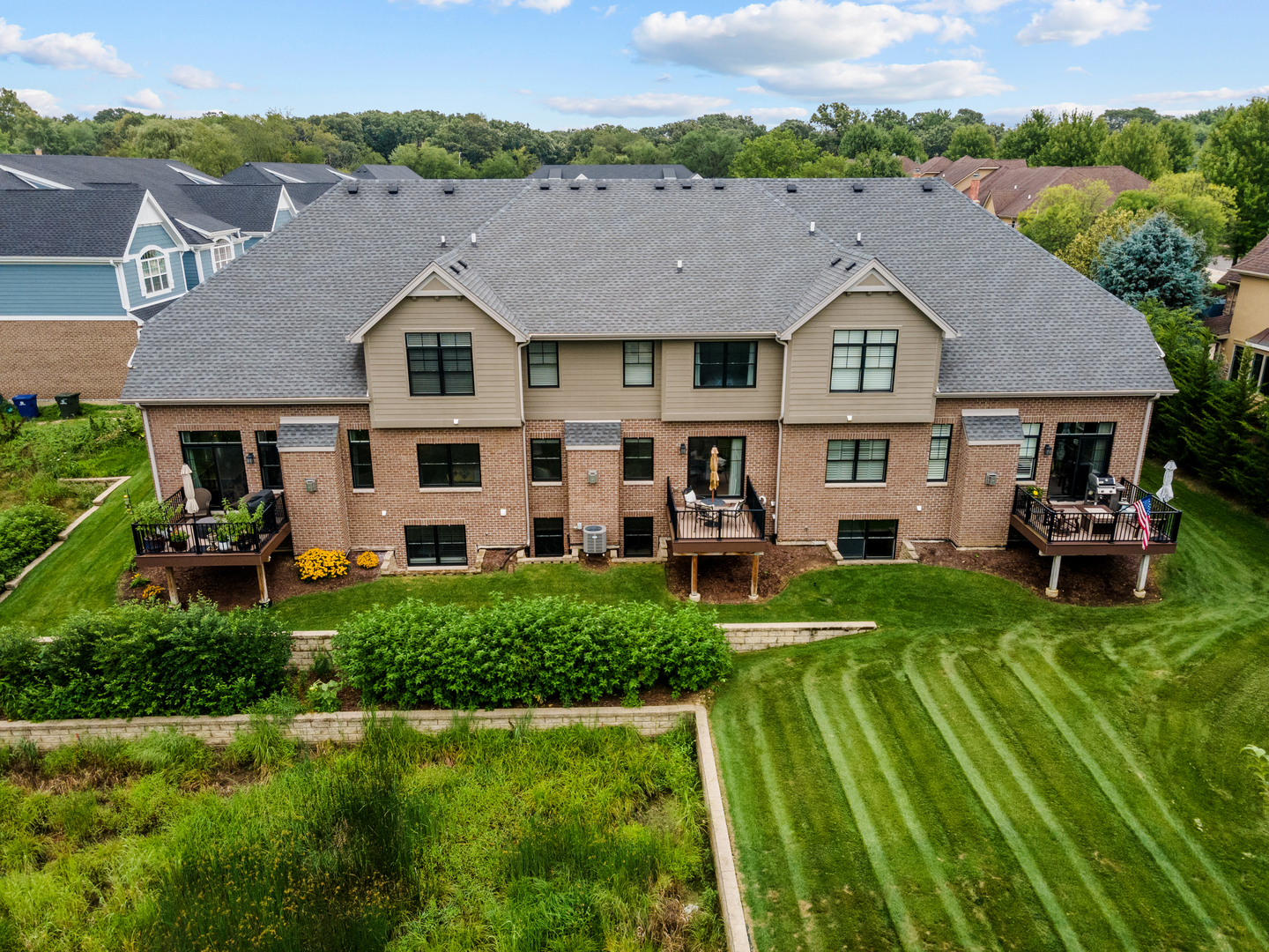 613 Bourbon Lane Naperville, IL 60565 - Photo 22 of 36 a aerial view of a house with a yard table and chairs