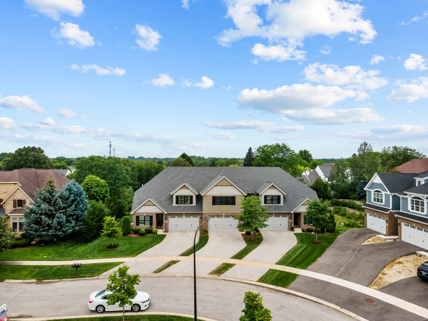 613 Bourbon Lane Naperville, IL 60565 - Photo 29 of 36 a front view of a house with a yard