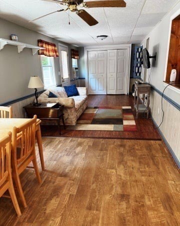 759 North Main Road, Unit V8J Otis, MA 01253 - Photo 7 of 21 a living room with furniture and a rug
