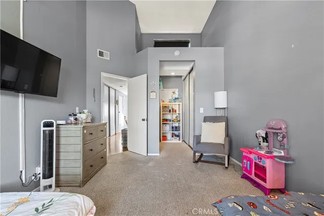 a view of a bedroom with baby toys