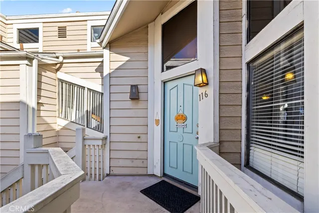 a view of a balcony a door and an empty space