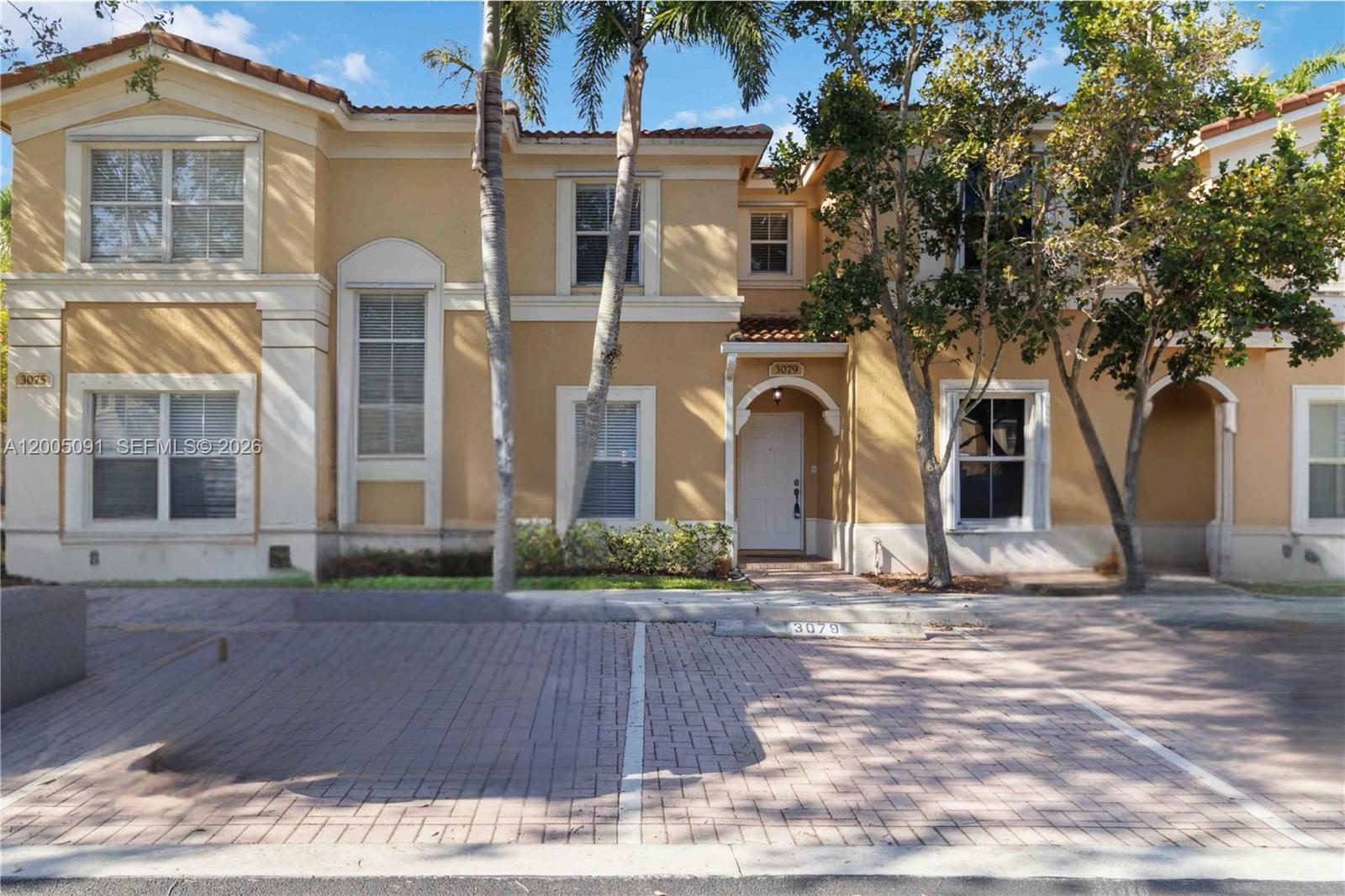 3079 Southwest 129th Way, Unit 159 Miramar, FL 33027 - Photo 2 of 44 a front view of a house