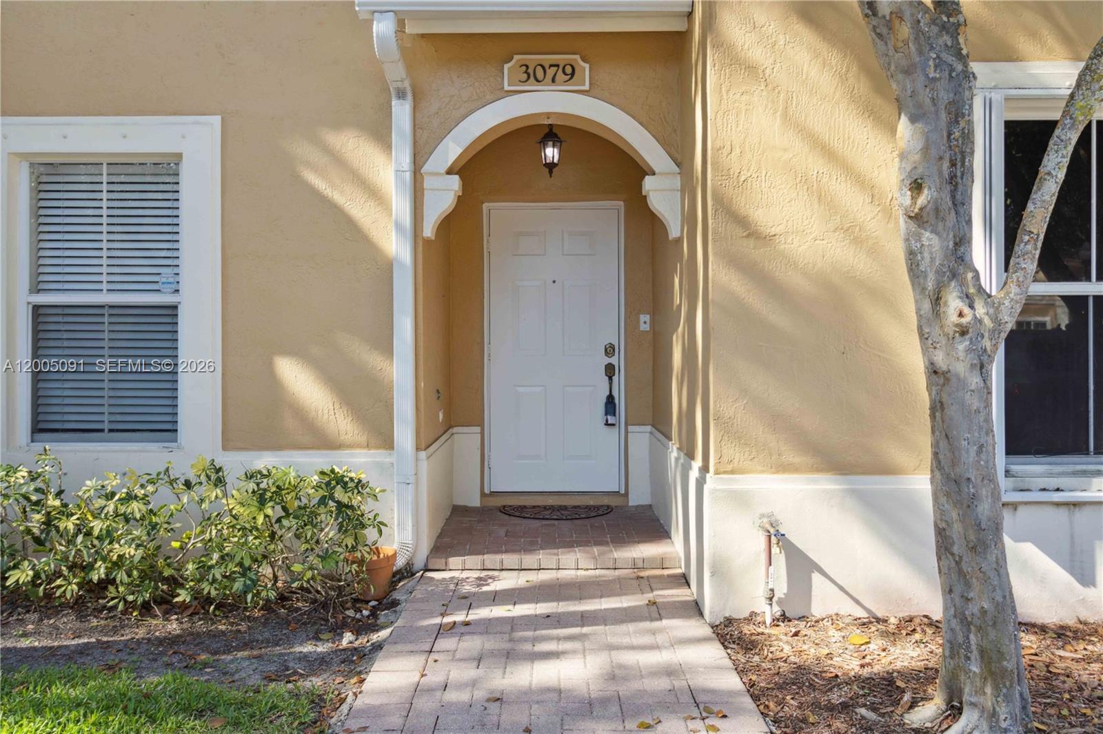 3079 Southwest 129th Way, Unit 159 Miramar, FL 33027 - Photo 3 of 44 a view of a entrance of the house