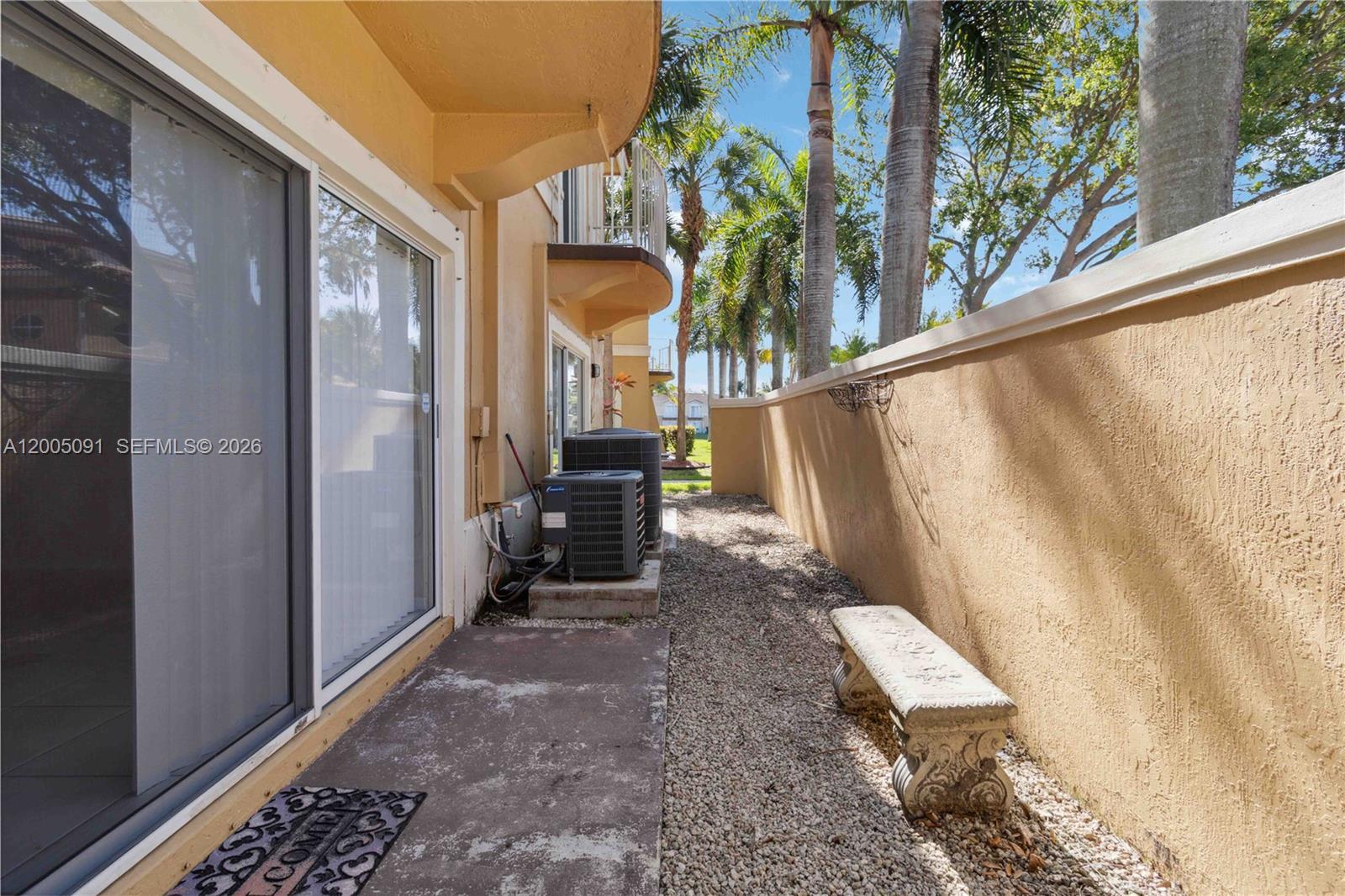 3079 Southwest 129th Way, Unit 159 Miramar, FL 33027 - Photo 34 of 44 a view of outdoor space and porch