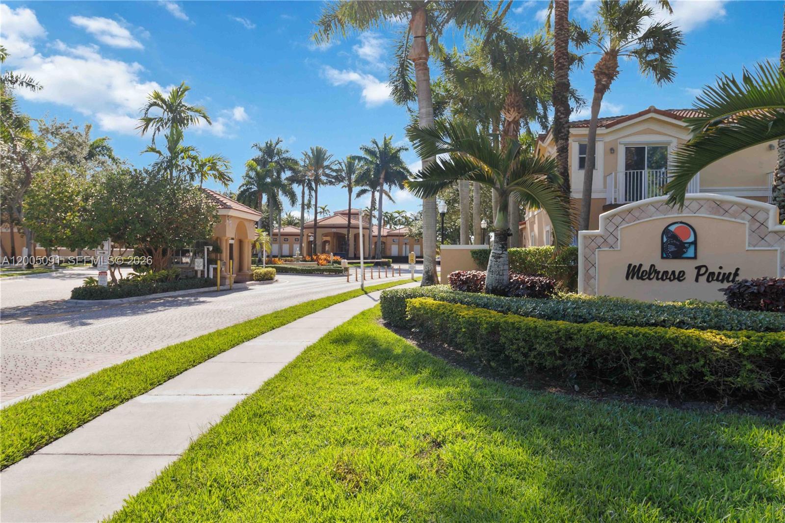 3079 Southwest 129th Way, Unit 159 Miramar, FL 33027 - Photo 39 of 44 a view of a fountain in front of house