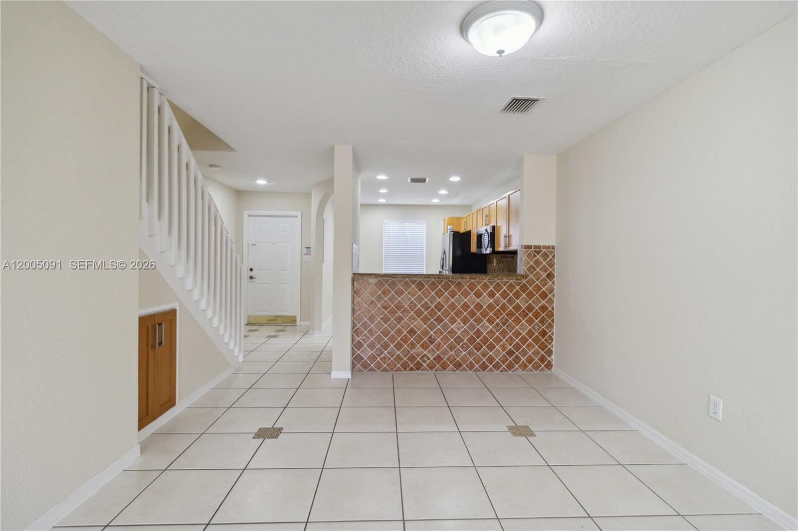 3079 Southwest 129th Way, Unit 159 Miramar, FL 33027 - Photo 4 of 44 a view of kitchen with windows