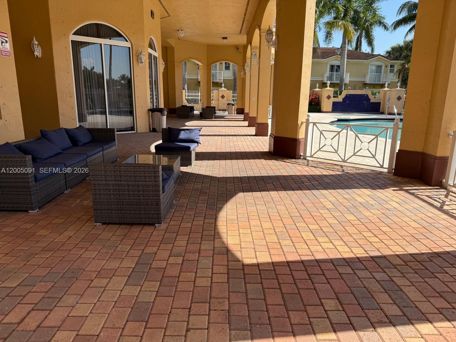 3079 Southwest 129th Way, Unit 159 Miramar, FL 33027 - Photo 41 of 44 a living room with furniture