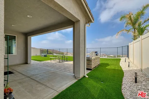 a view of a backyard with a garden