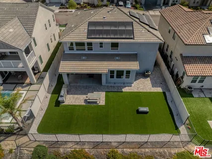 a view of a house with swimming pool