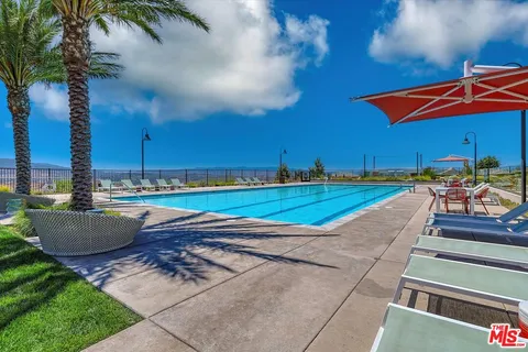 a view of a house with a street