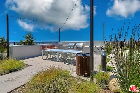 a view of a park with a slide