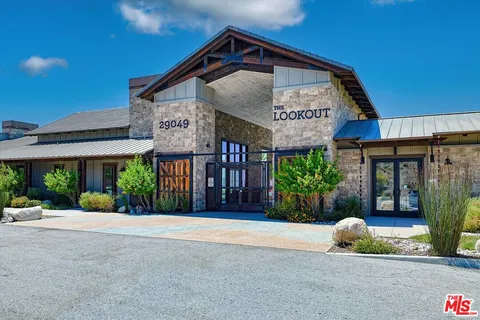 a view of street with houses