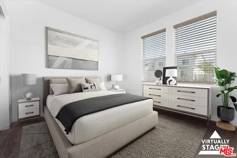 a kitchen with granite countertop a stove a sink and a table