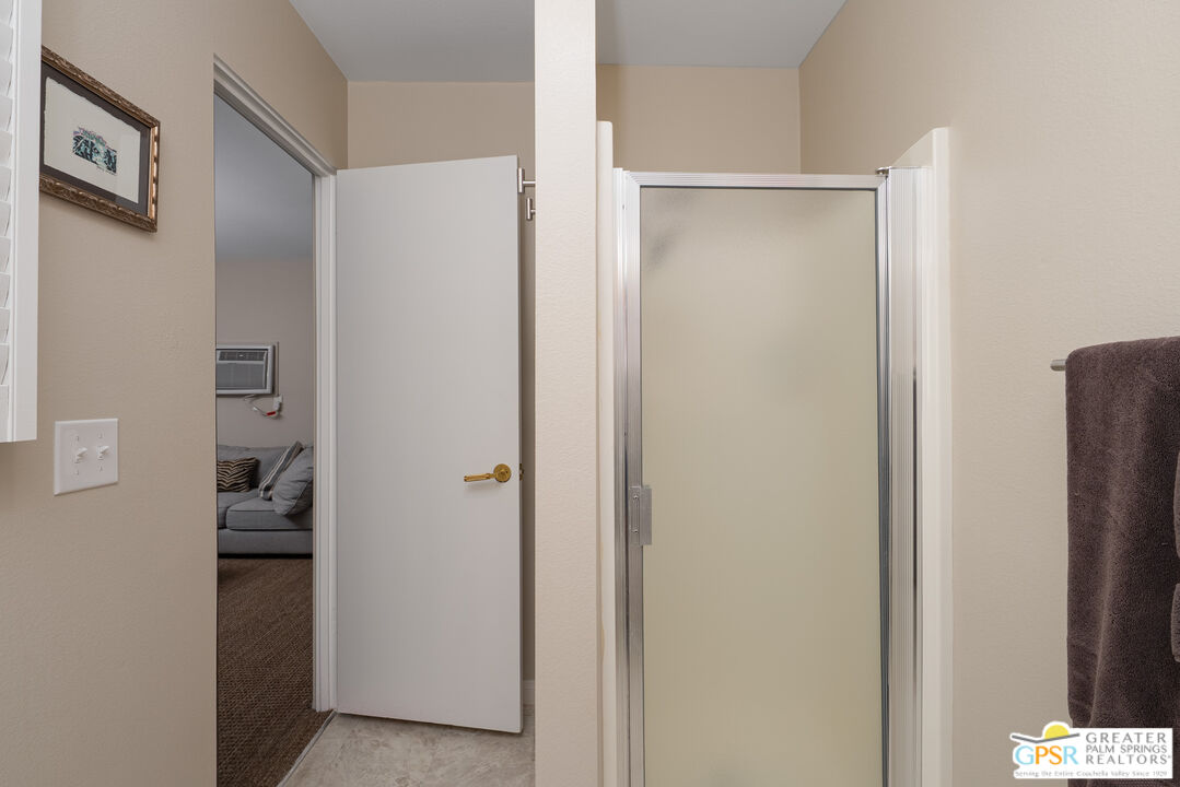 566 North Sunset Way Palm Springs, CA 92262 - Photo 27 of 39 a view of a walk in closet