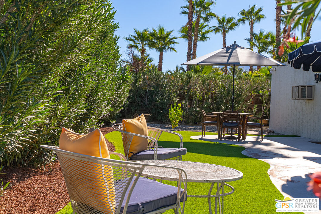 566 North Sunset Way Palm Springs, CA 92262 - Photo 35 of 39 a view of a swimming pool with a patio