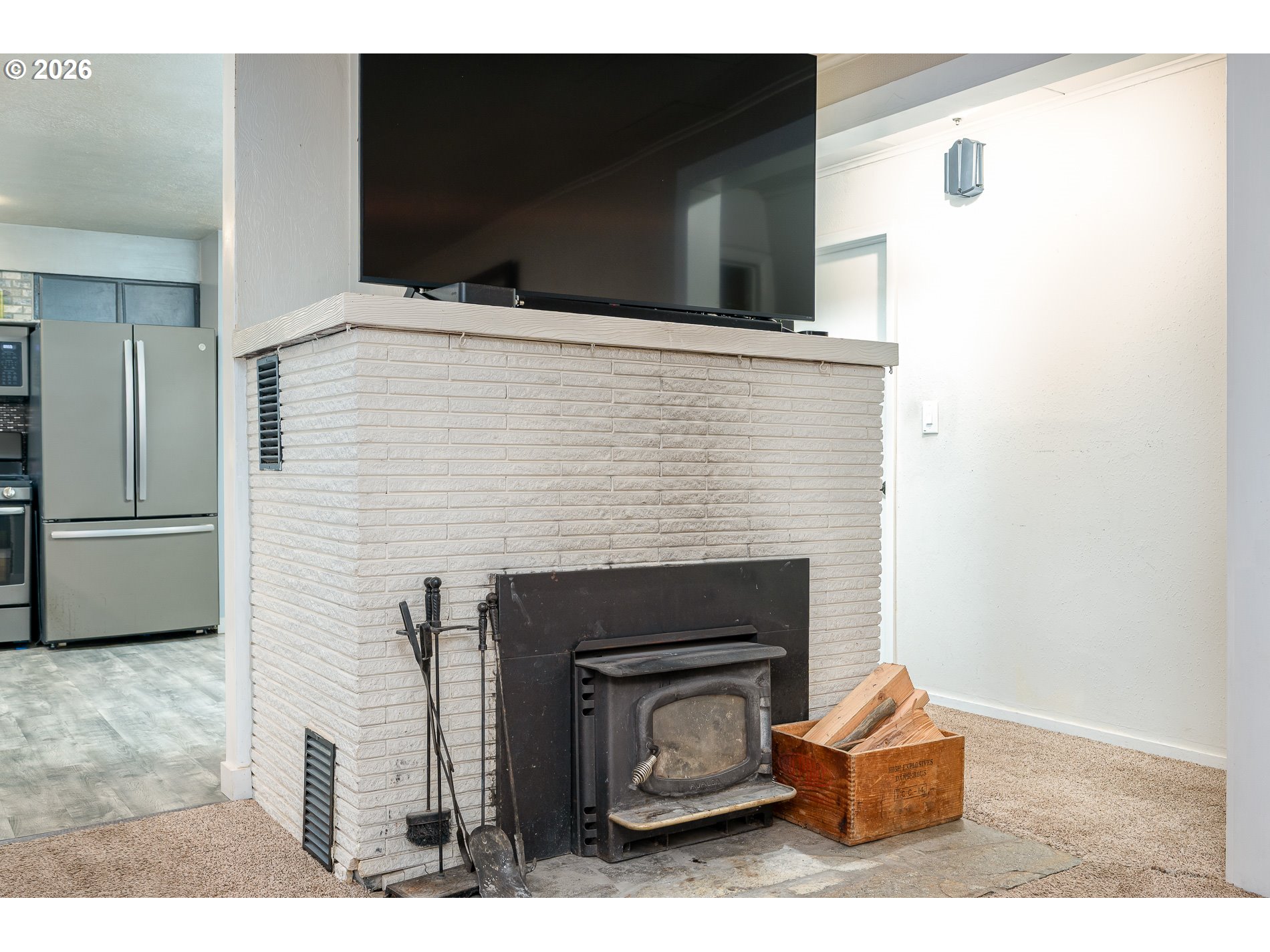 2685 Southwest 89th Avenue Portland, OR 97225 - Photo 12 of 37 a living room with furniture and a fireplace