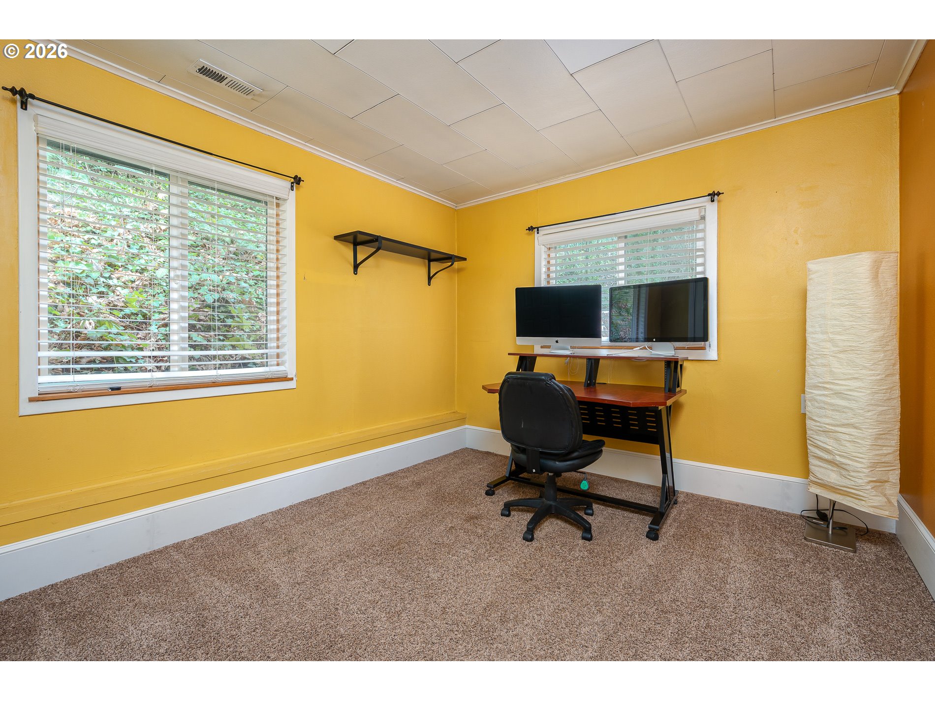 2685 Southwest 89th Avenue Portland, OR 97225 - Photo 27 of 37 a view of a workspace with furniture and a window