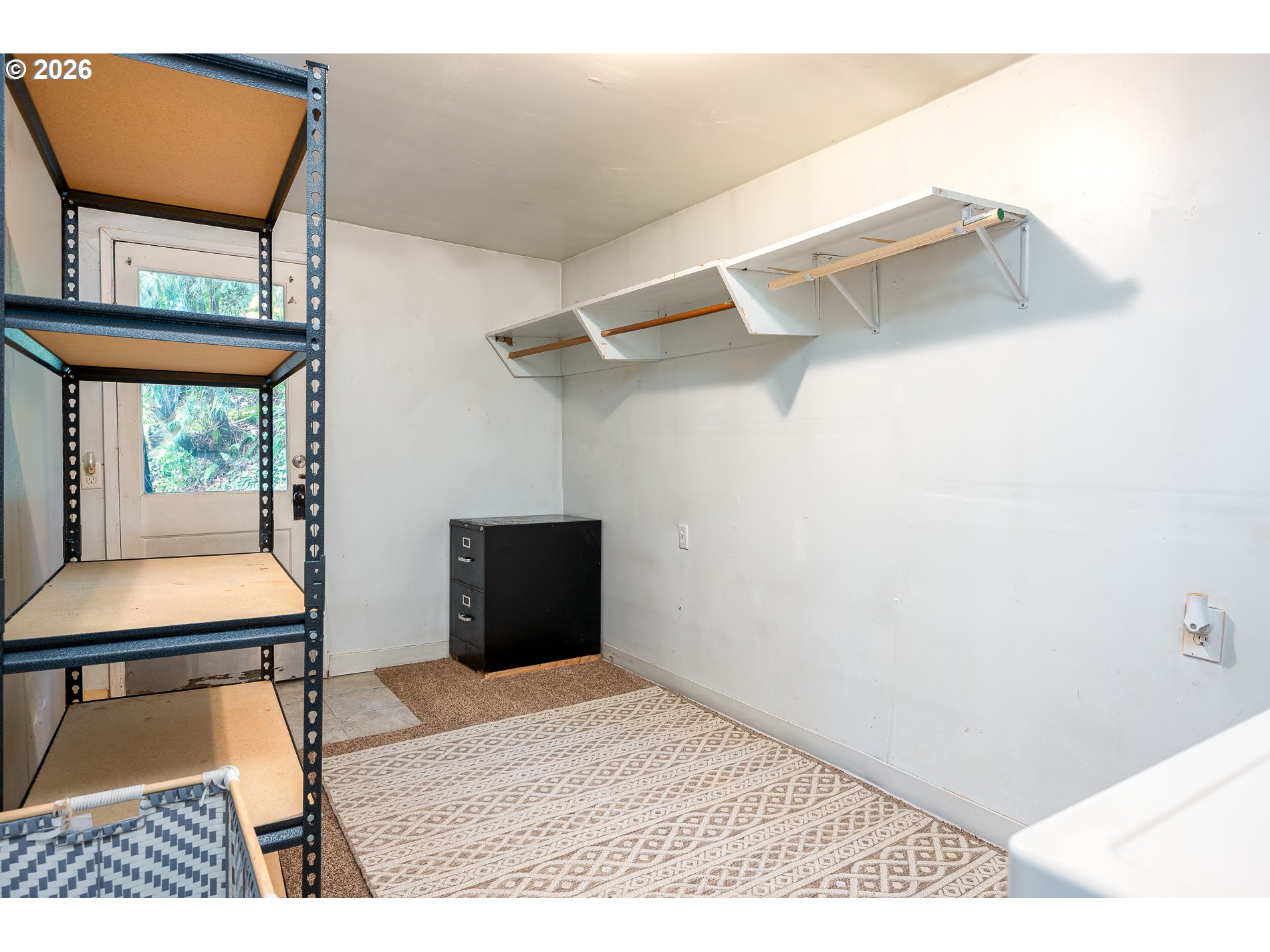 2685 Southwest 89th Avenue Portland, OR 97225 - Photo 29 of 37 a room with cabinets and wooden floor