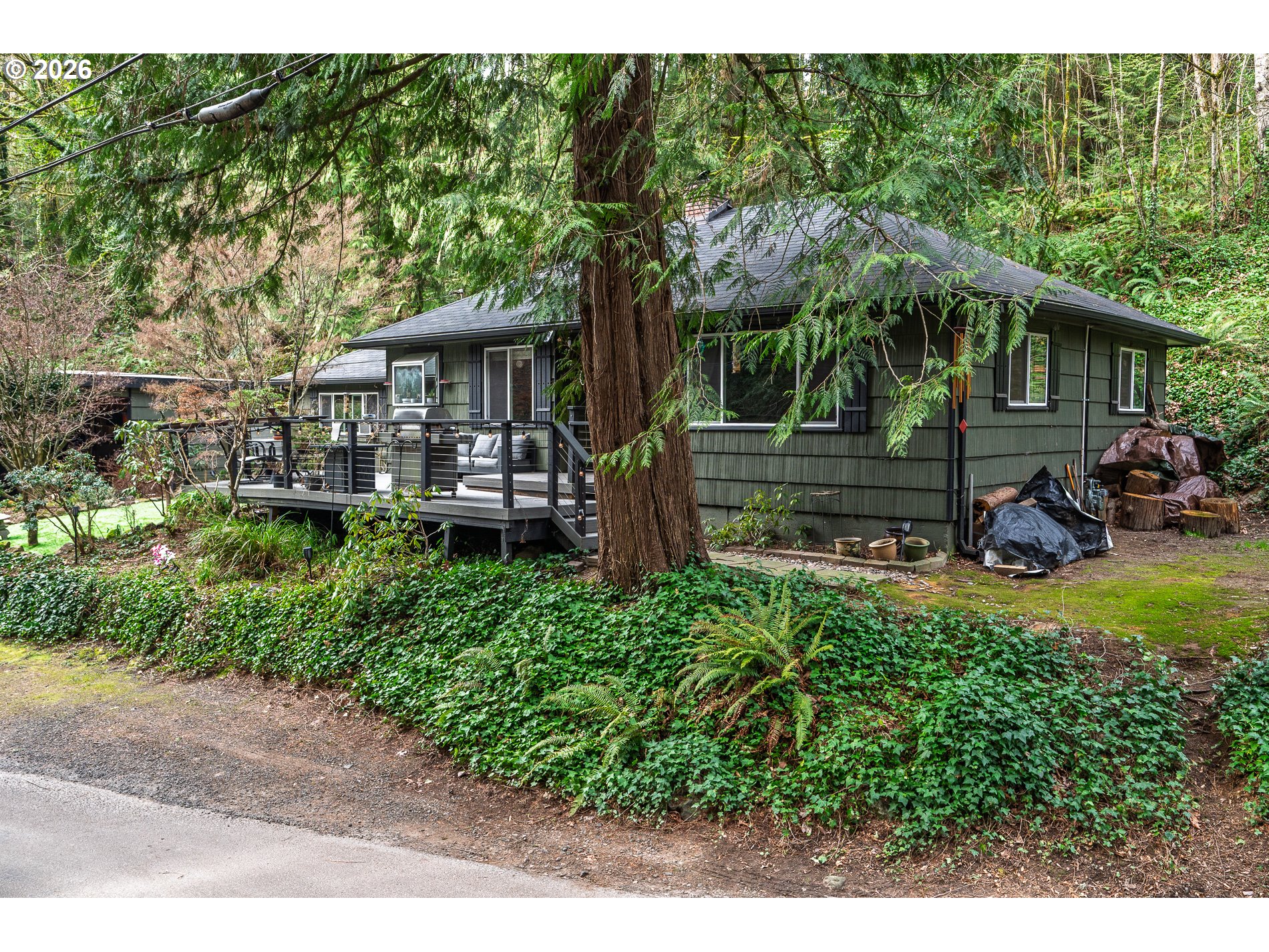 2685 Southwest 89th Avenue Portland, OR 97225 - Photo 3 of 37 a front view of a house with garden