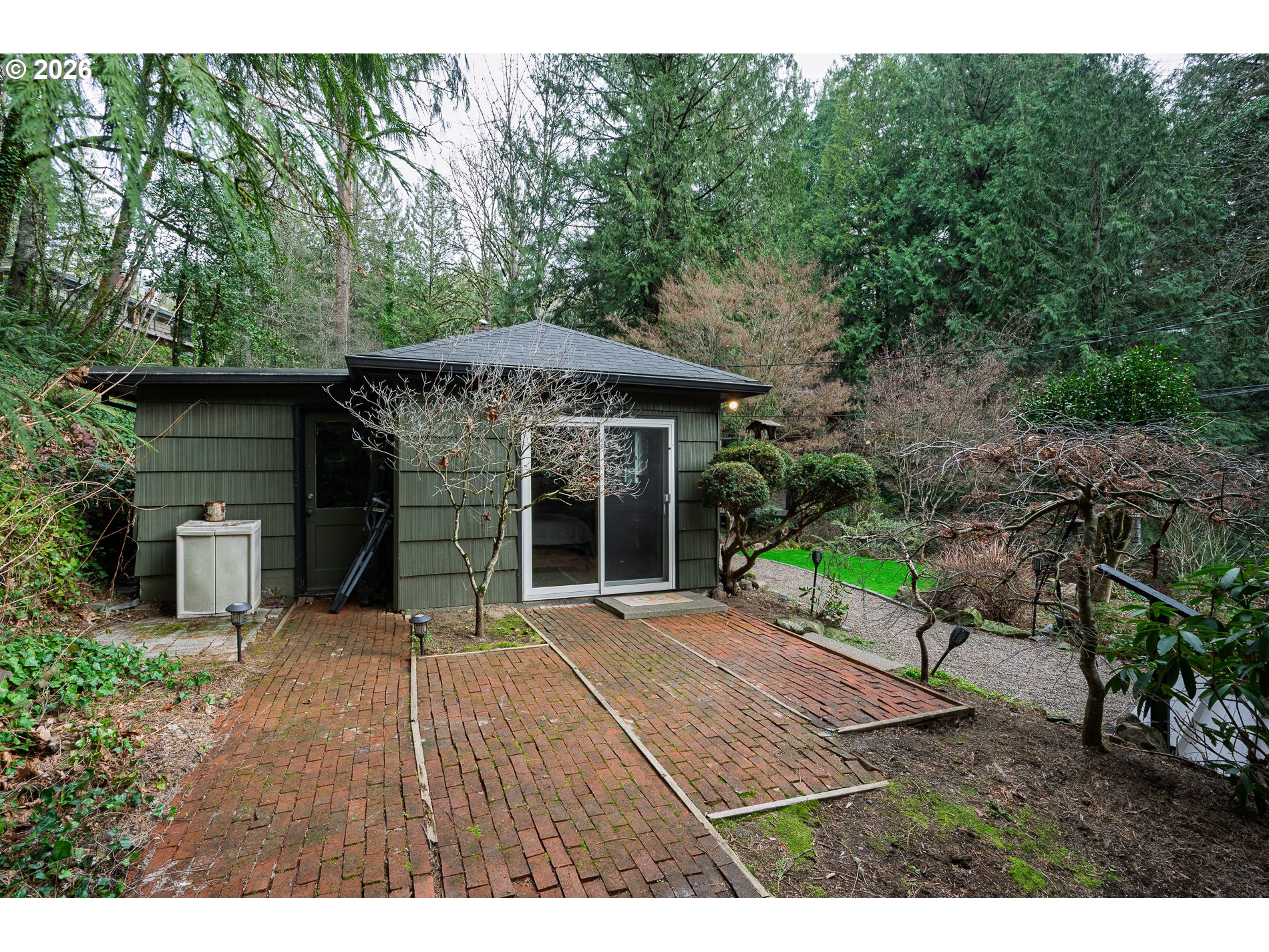2685 Southwest 89th Avenue Portland, OR 97225 - Photo 34 of 37 a front view of a house with garden