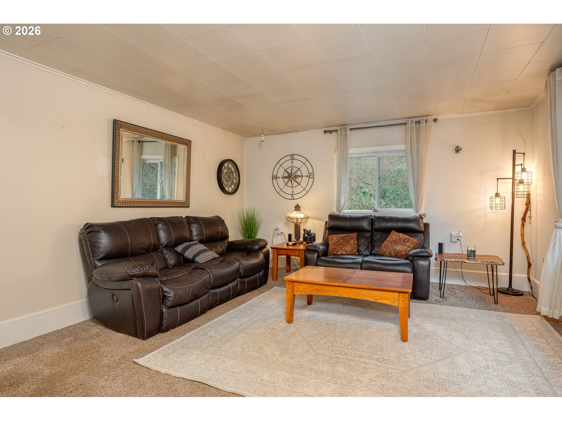 2685 Southwest 89th Avenue Portland, OR 97225 - Photo 8 of 37 a living room with furniture and a large window