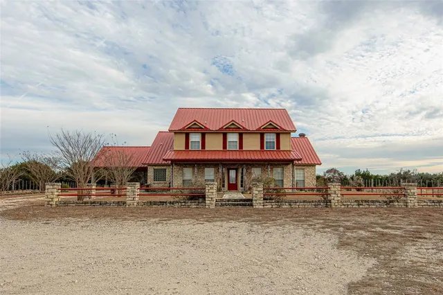 a front view of a house with a porch