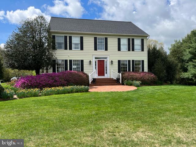 17545 Hardy Road Mount Airy, MD 21771 - Photo 1 of 1 a front view of a house with a yard and garage