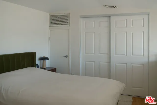 a bedroom with a bed