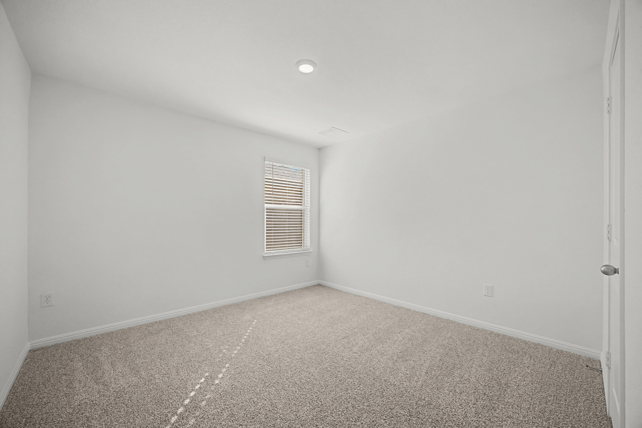 1932 Bandito Bluff Pass Leander, TX 78641 - Photo 14 of 21 a view of an empty room with a window