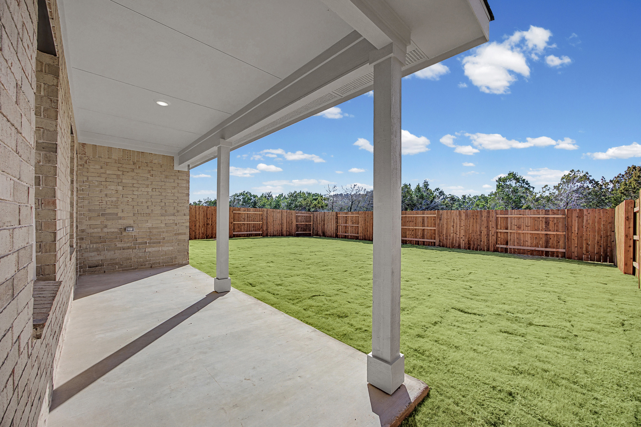 1932 Bandito Bluff Pass Leander, TX 78641 - Photo 19 of 21 a view of a porch with a backyard