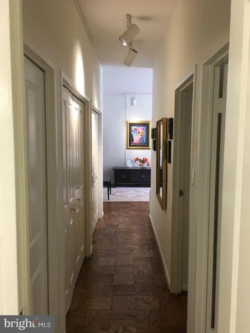 a view of gallery with windows