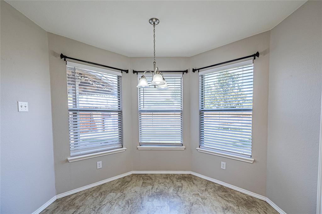 1805 Creek Crossing Garland, TX 75040 - Photo 17 of 39 a view of an empty room with a window