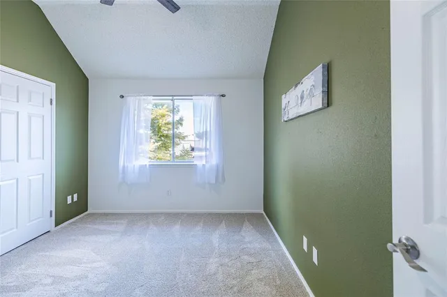 an empty room that has a window