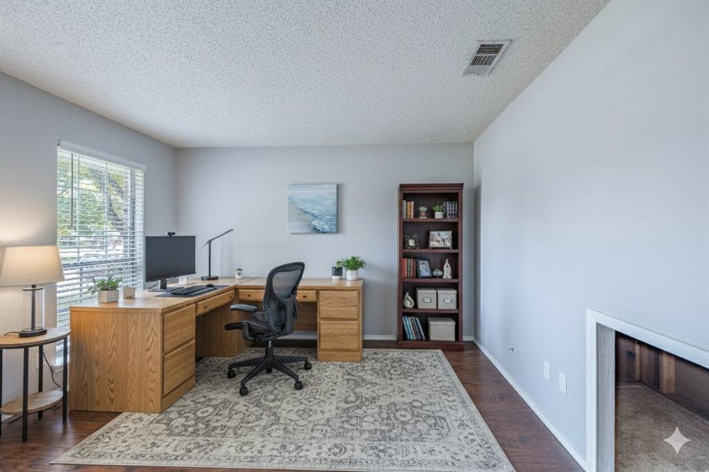 1805 Creek Crossing Garland, TX 75040 - Photo 6 of 39 a view of a workspace with furniture and a window