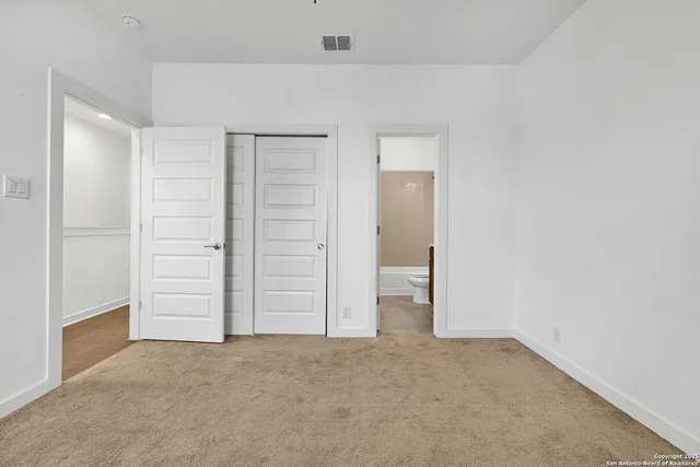 an empty room with closet