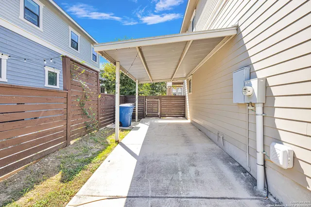 a view of a backyard with a small cabin