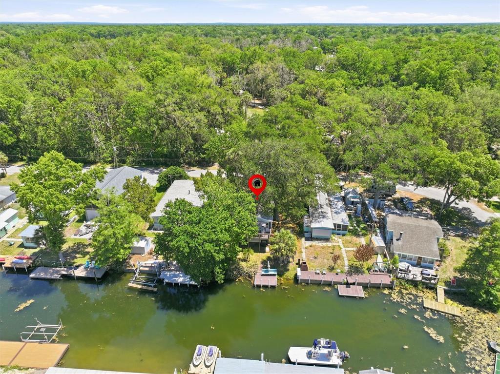 6169 Waverly Road Weeki Wachee, FL 34607 - Photo 11 of 51 a view of a lake with houses