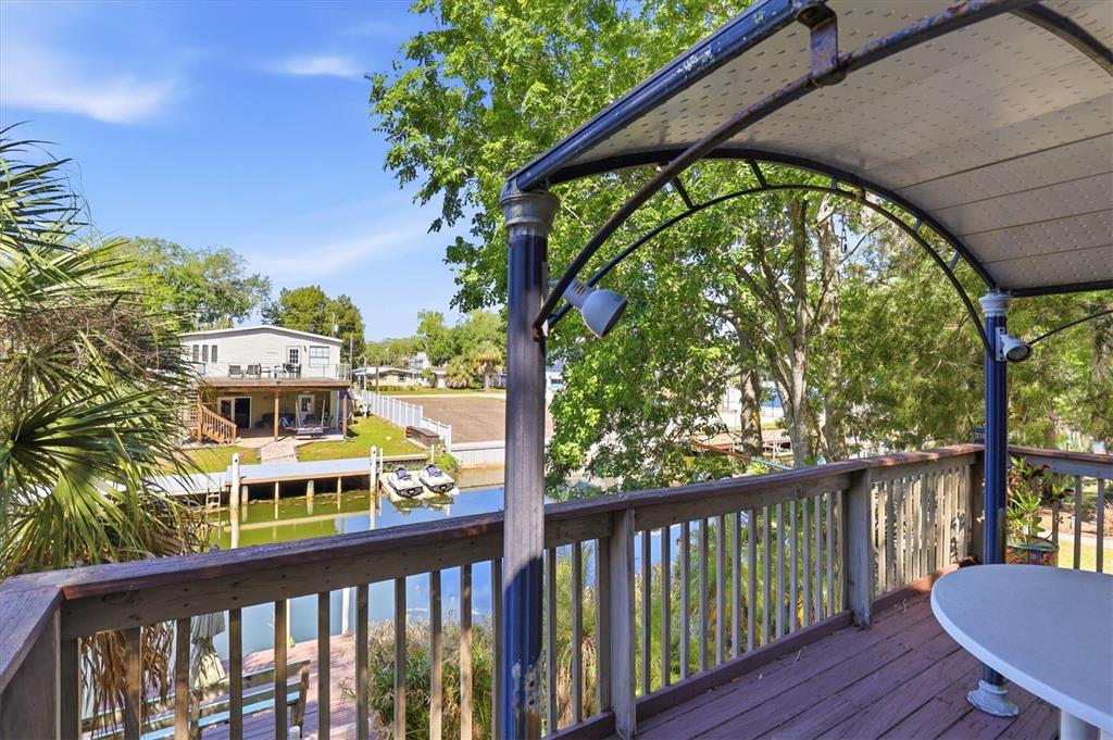 6169 Waverly Road Weeki Wachee, FL 34607 - Photo 3 of 51 a view of a city from a balcony