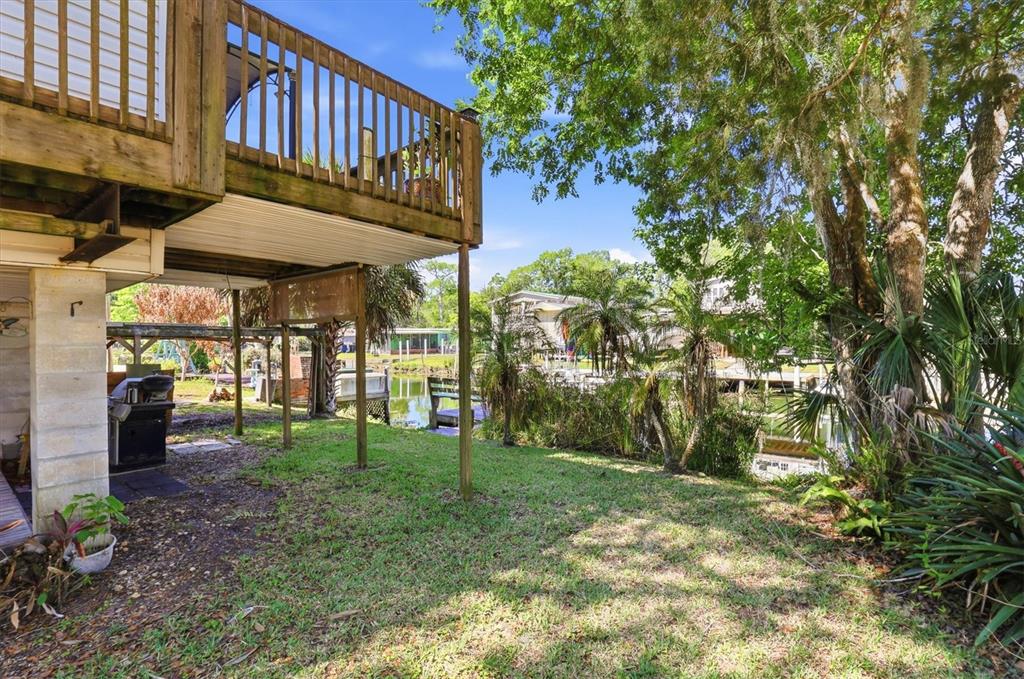 6169 Waverly Road Weeki Wachee, FL 34607 - Photo 49 of 51 a view of a pathway of a house