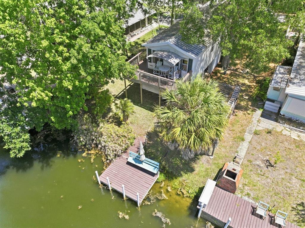 6169 Waverly Road Weeki Wachee, FL 34607 - Photo 10 of 51 a view of a house with a yard