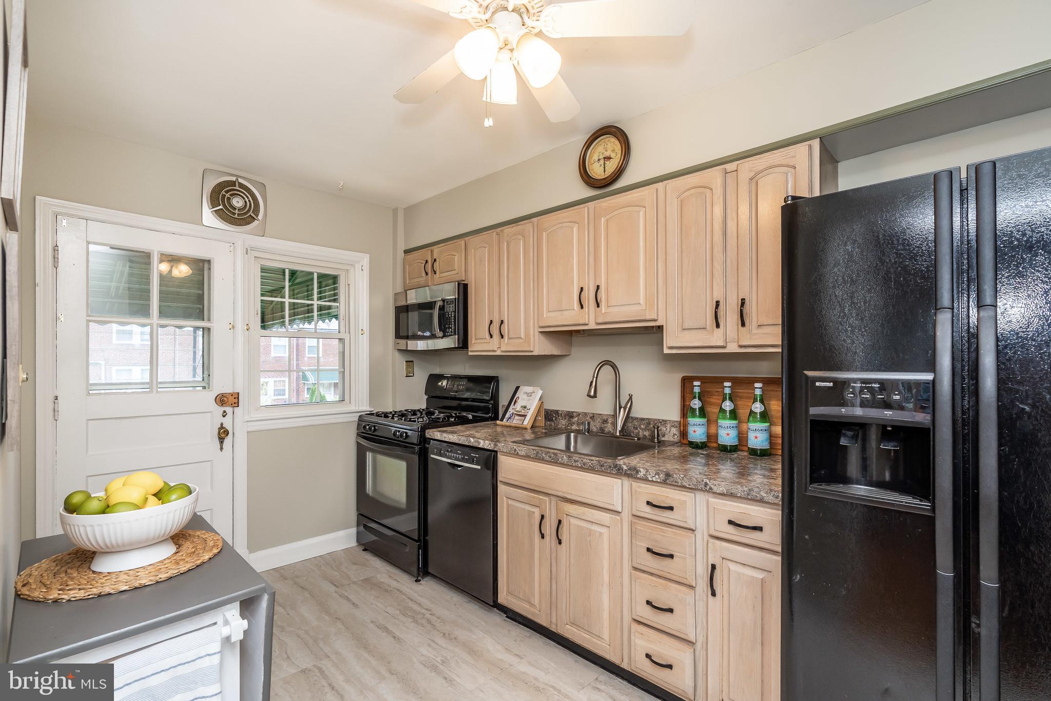 413 Stratford Road Baltimore, MD 21228 - Photo 13 of 42 Updated Kitchen with sleek black appliances
