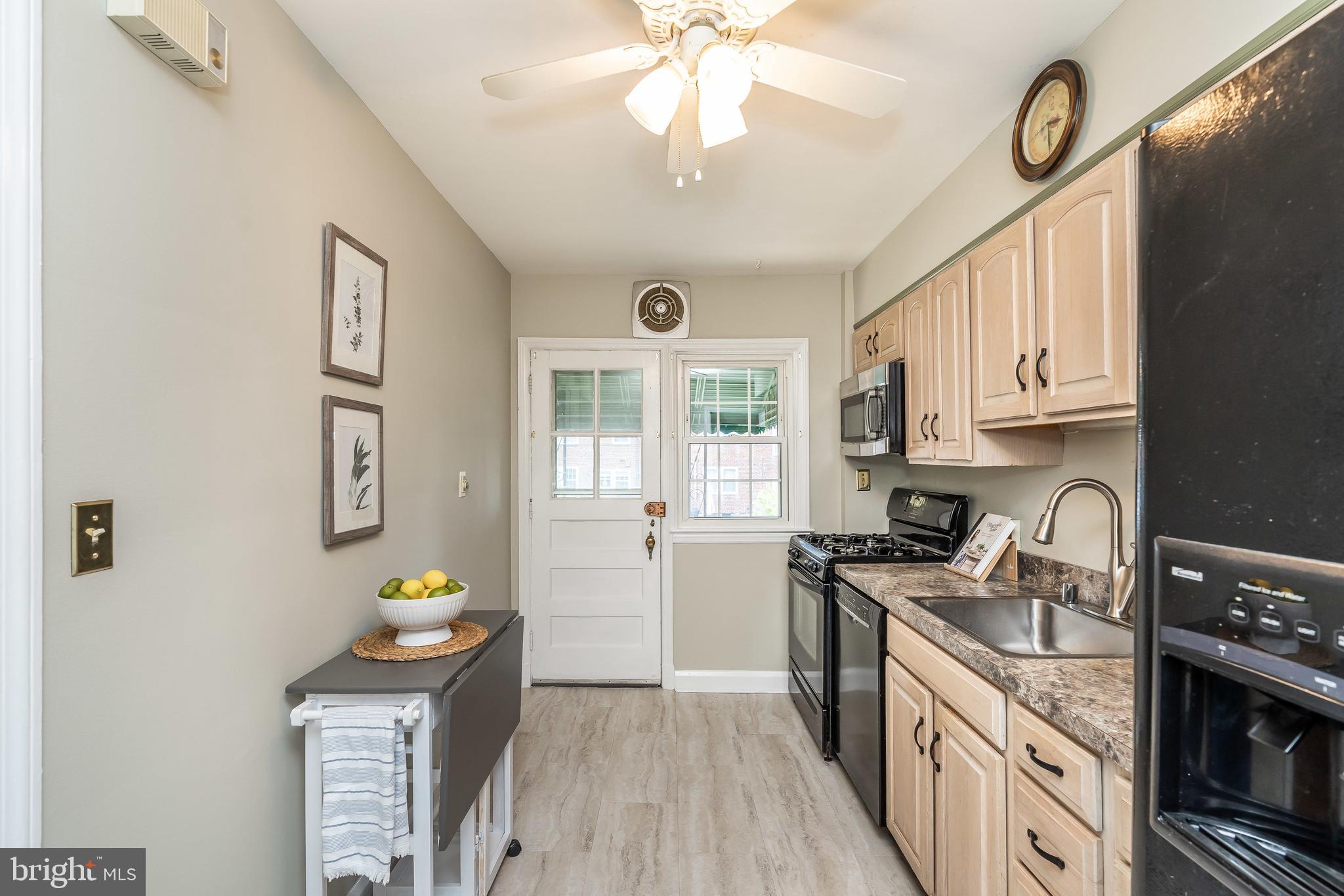 413 Stratford Road Baltimore, MD 21228 - Photo 15 of 42 Updated vinyl flooring