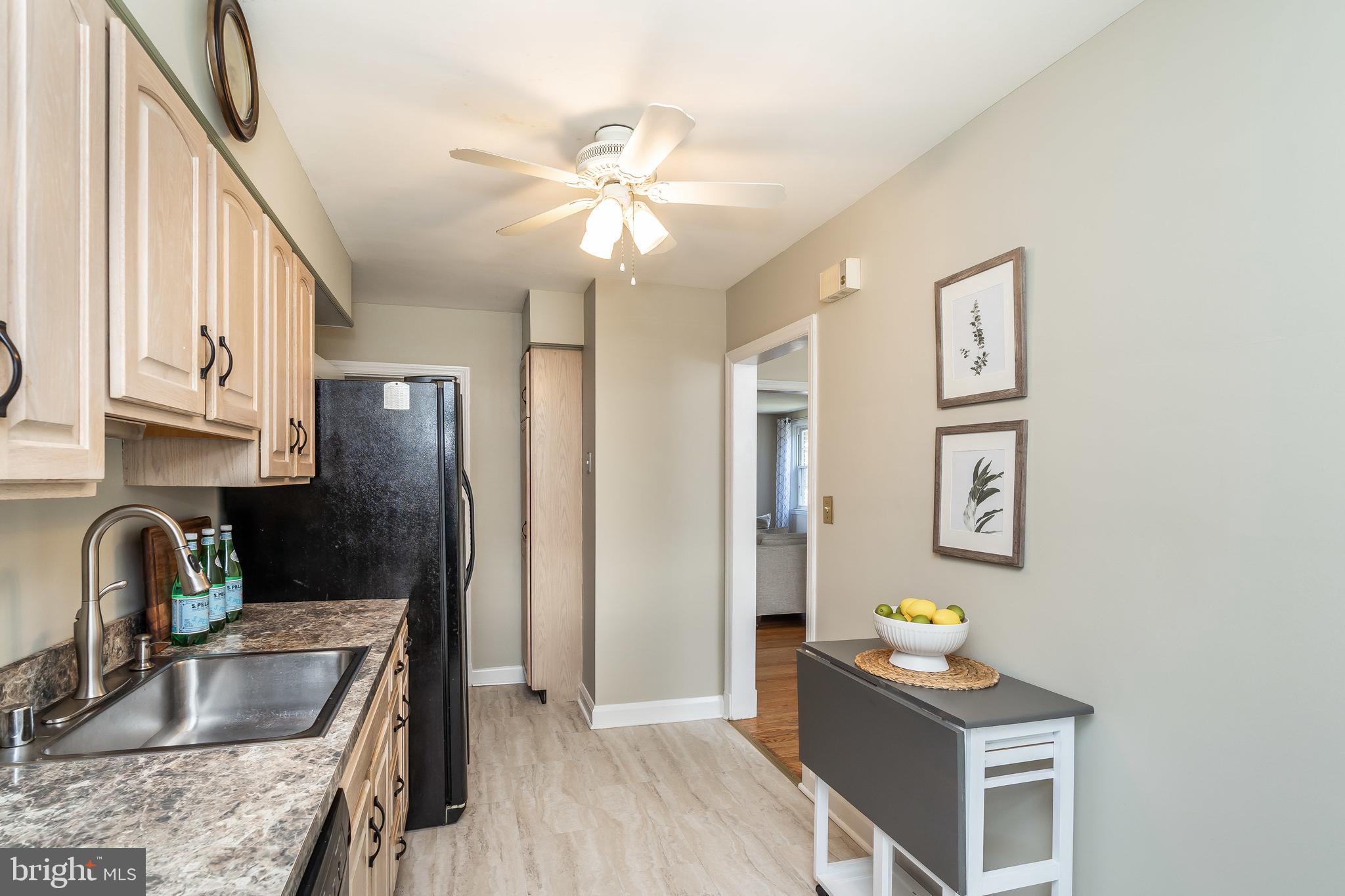 413 Stratford Road Baltimore, MD 21228 - Photo 16 of 42 Ceiling fan for year round comfort while you cook!