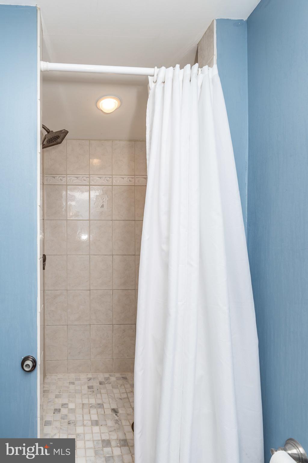 413 Stratford Road Baltimore, MD 21228 - Photo 30 of 42 Marble custom tile separate shower