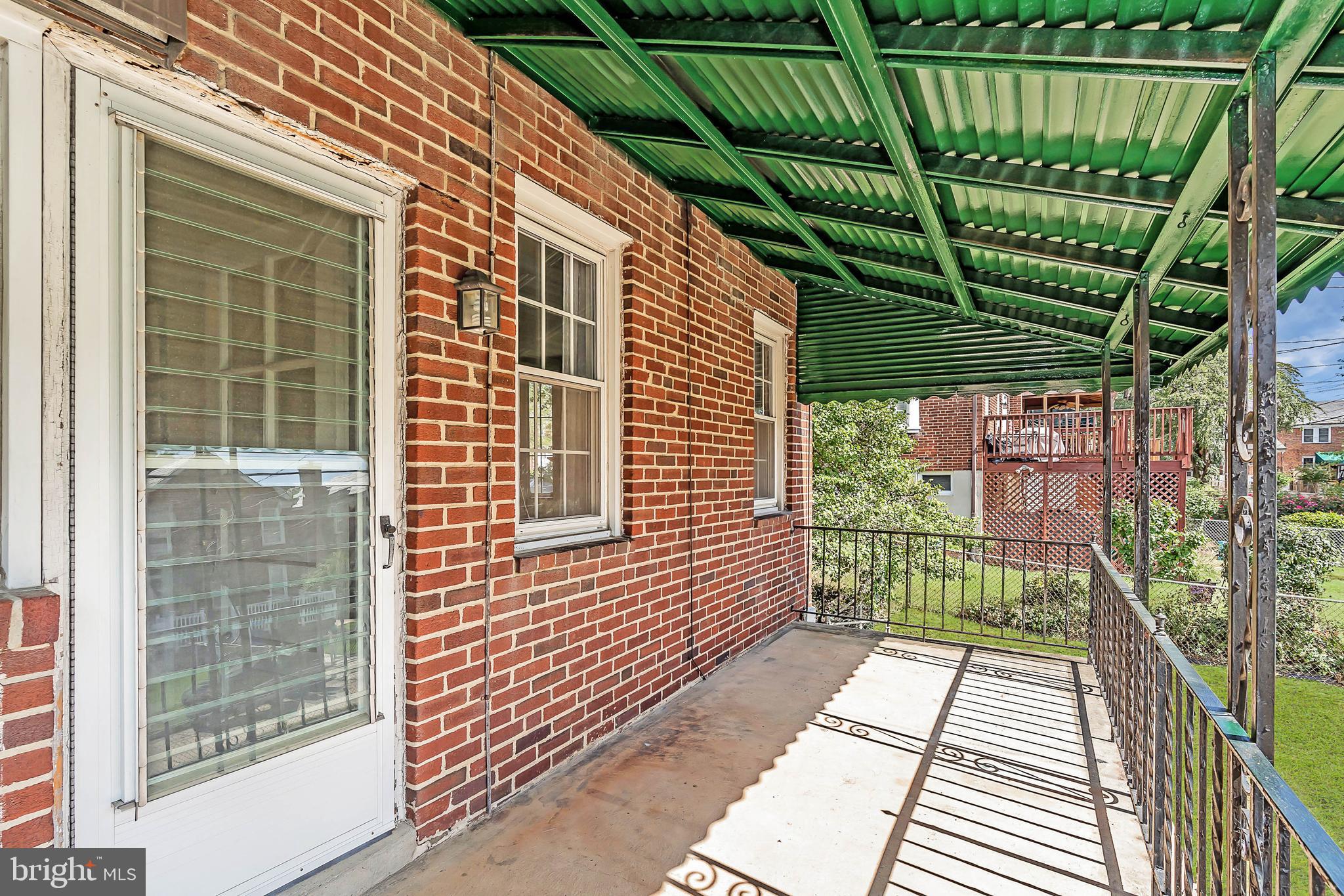 413 Stratford Road Baltimore, MD 21228 - Photo 31 of 42 Covered back porch