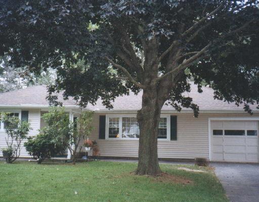 51 Waller Road Bridgeport, CT 06606 - Photo 1 of 1 front view of a house with a yard