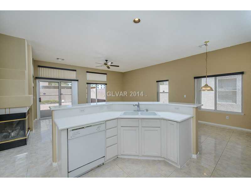 Property Photo. Kitchen w/ breakfast bar/ island