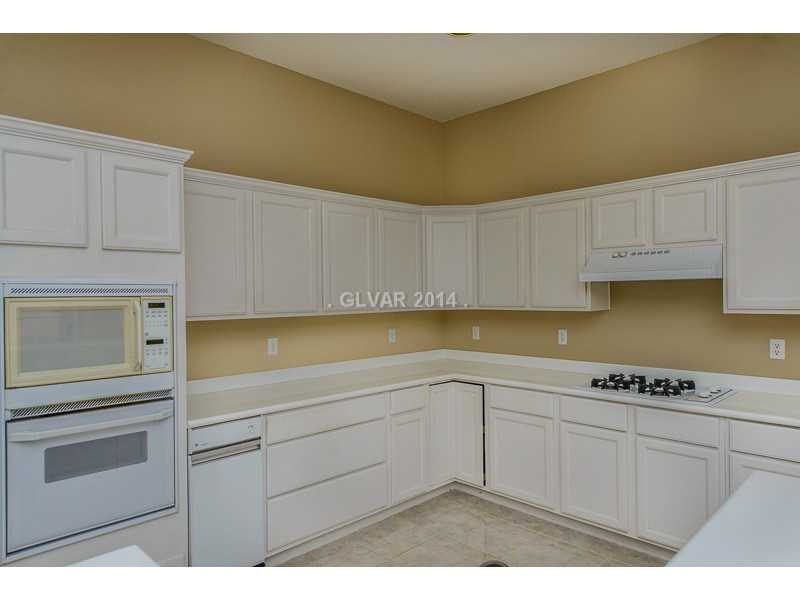 332 Kenya Road Las Vegas, NV 89119 - Photo 8 of 25 Property Photo. Kitchen w/ built-in microwave, gas over and cooktop
