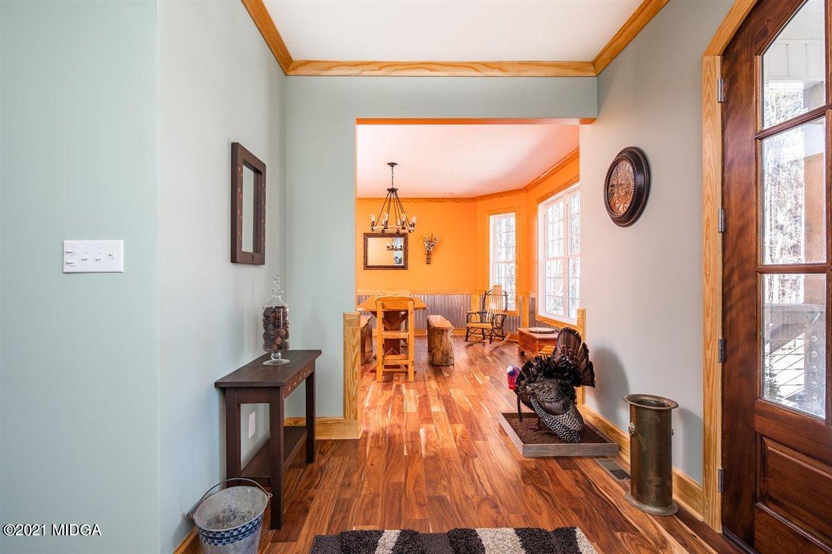 725 Taylor Road Juliette, GA 31046 - Photo 20 of 62 a very nice looking room with a large window and wooden floor